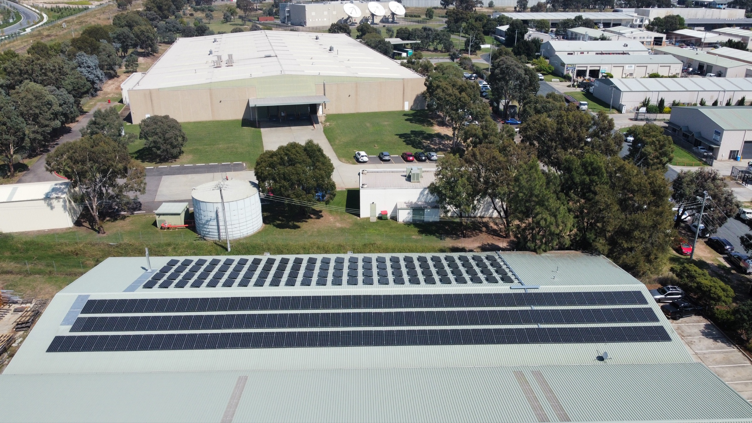 Aerial view of rooftop solar across an industrial park